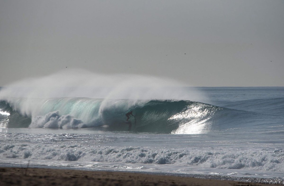 Brighton Truax surfing a barrel wave